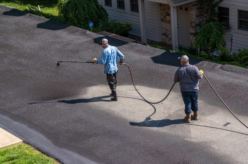 Applying driveway sealer