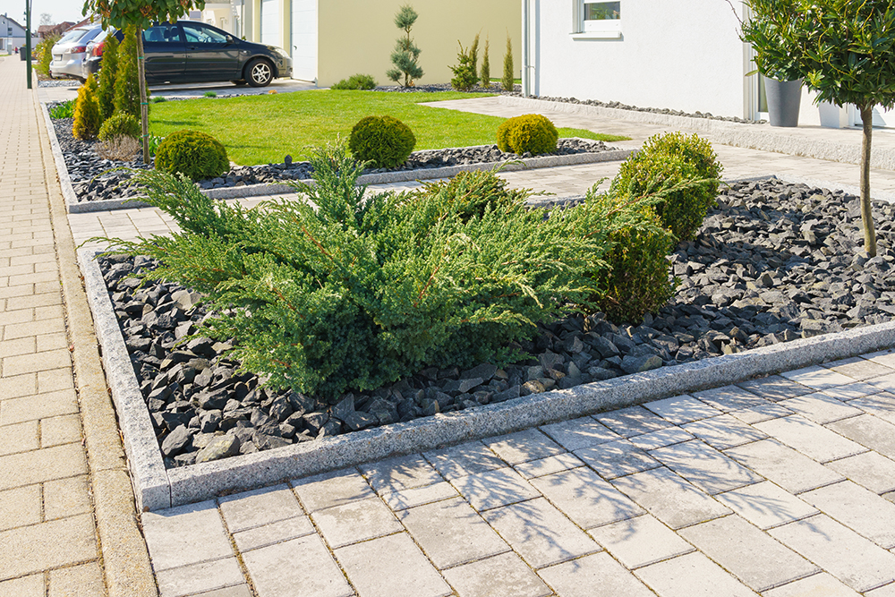 Modern landscaped front yard design and Residential Asphalt Paving driveway to garage