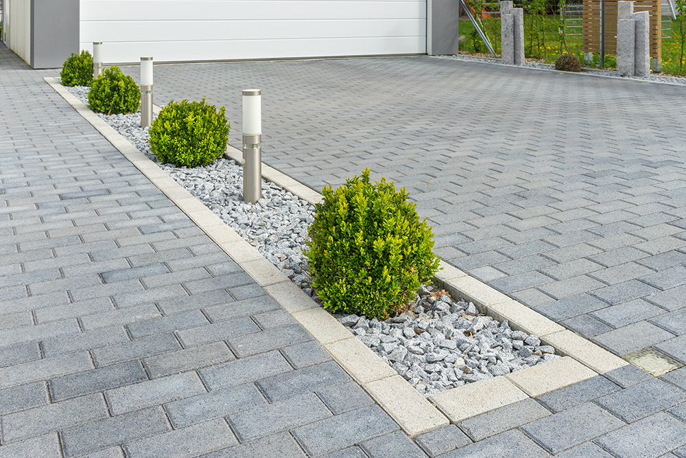 Boxwood in the garage Residential Asphalt Paving driveway in the suburbs