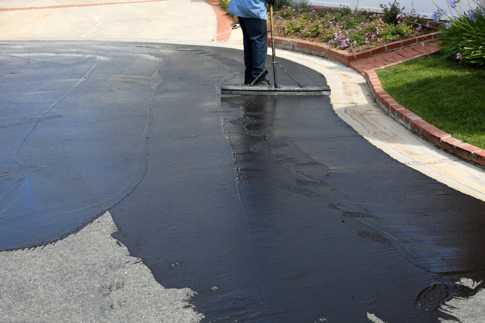Asphalt Maintenance, Seal Coating Private Drive Way.