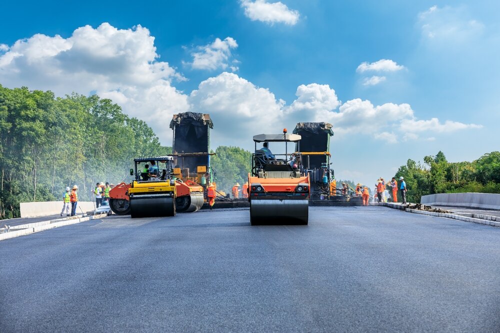 Paving Maintenance. Construction Is repairing Asphalt Pavement.